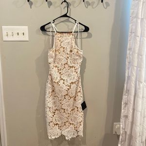 Never been worn, tags still attached.